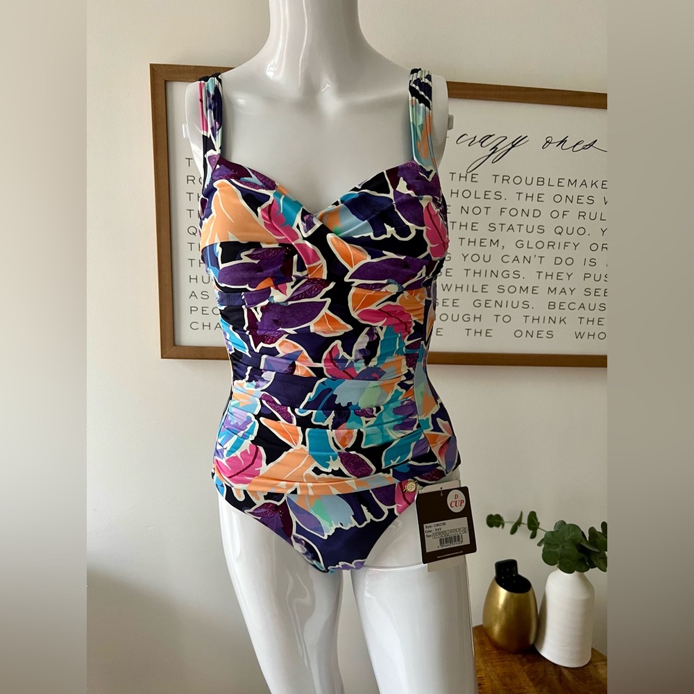 Sunseeker swimming suit. New with tags. Size 4